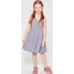 Sukienka w kratę gingham dla dziewczynki Little Princess - Biały. Sukienki dla dziewczynek marki Mohito. W wyprzedaży za 49.99 zł.
