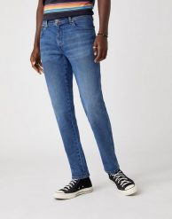 MĘSKIE SPODNIE JEANSOWE WRANGLER TEXAS TAPER THE ACE W12TU542Q 112126553. Spodnie materiałowe męskie Wrangler, l, bez wzorów, z jeansu. Za 219.99 zł.