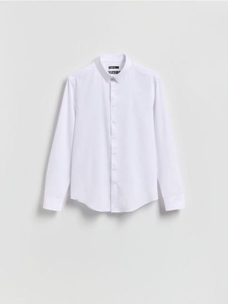 Koszula slim fit - biały. Białe koszule męskie Reserved, l, bez wzorów, z tkaniny, bez kołnierzyka, bez ramiączek. Za 129.99 zł.