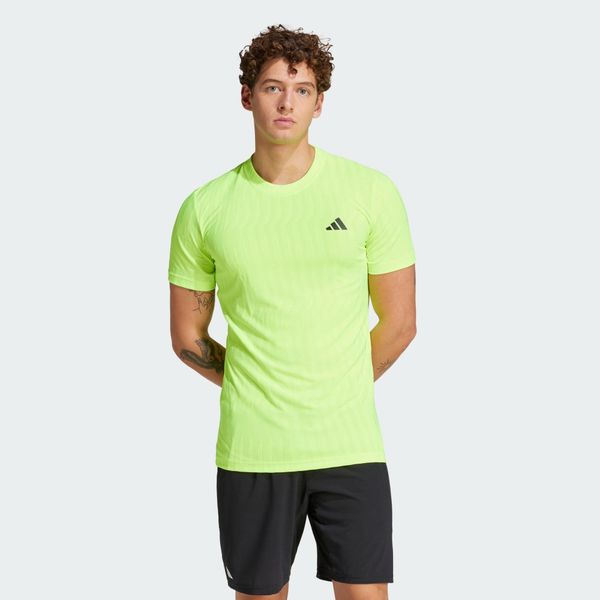 Koszulka Tennis Climacool+ AIRCHILL FreeLift. Żółte koszulki sportowe męskie Adidas, s, bez wzorów, bez kołnierzyka, bez ramiączek, tenisowe, climacool (adidas). Za 255.30 zł.