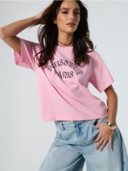 Bawełniana koszulka z napisem - różowy. Czerwone t-shirty damskie Sinsay, l, bez wzorów, z bawełny, bez kołnierzyka. W wyprzedaży za 19.99 zł.