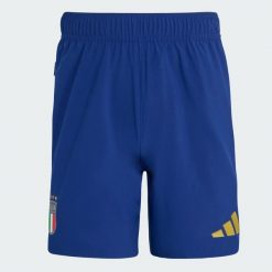 Szorty Włochy Tiro Travel. Niebieskie krótkie spodenki sportowe męskie Adidas, bez wzorów, z elastanu, do piłki nożnej. Za 219.00 zł.