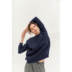 Bluza do jogi Moonholi Cozy AF Oversize Sweatshirt z bawełnianej dzianiny. Niebieskie bluzy damskie MOONHOLI, xs, bez wzorów, z bawełny, bez kaptura. Za 329.00 zł.