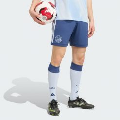 Spodenki Ajax Amsterdam 26/27 z trzeciego zestawu. Niebieskie krótkie spodenki sportowe męskie Adidas, m, bez wzorów, z materiału, do piłki nożnej, climacool (adidas). Za 199.00 zł.