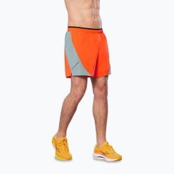 Spodenki do biegania męskie Mizuno Alpha 5.5". Brązowe krótkie spodenki sportowe męskie Mizuno, m, bez wzorów, do biegania. Za 139.99 zł.