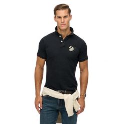 Haftowana koszulka polo Superdry Vintage Athletic. Niebieskie koszulki polo męskie Superdry., m, bez wzorów, klasyczne, bez ramiączek. Za 256.75 zł.