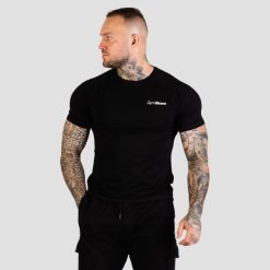 Koszulka męska fitness slim z krótkim rękawem czarna TRN. Czarne koszulki sportowe męskie GYMBEAM, m, bez wzorów, z bawełny, bez kołnierzyka, bez ramiączek, na fitness i siłownię. Za 72.90 zł.