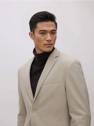 Marynarka slim fit - beżowy. Brązowe marynarki męskie Reserved, bez wzorów, z dzianiny. Za 259.99 zł.