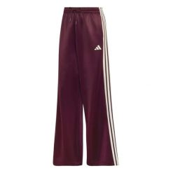 Spodnie Adidas Sport W Stadium Tp Damskie. Fioletowe spodnie sportowe damskie Adidas, m, bez wzorów, z bawełny, do biegania. Za 357.99 zł.