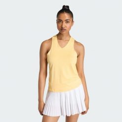 Koszulka Club Tennis Climacool V-Neck. Brązowe koszulki sportowe damskie Adidas, bez wzorów, bez kołnierzyka, bez ramiączek, tenisowe, climacool (adidas). Za 149.00 zł.