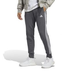 Spodnie męskie adidas Essentials French Terry Tapered Cuff 3-Stripes. Białe buty sportowe męskie Adidas, m, bez wzorów, na fitness i siłownię. Za 210.40 zł.