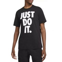 Koszulka Sportowa Męska Nike M NSW Tee Just Do It FS. Czarne koszulki sportowe męskie Nike, m, bez wzorów, bez kołnierzyka, bez ramiączek. Za 110.00 zł.