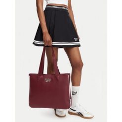Torebka Reebok. Czerwone torebki do ręki damskie Reebok, bez wzorów, bez dodatków. Za 149.99 zł.