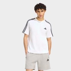 Koszulka fitness męska ADIDAS. Koszulki sportowe męskie Adidas, m, bez wzorów, z bawełny, bez kołnierzyka, bez ramiączek, na fitness i siłownię. Za 129.99 zł.