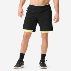 Spodenki fitness cardio męskie. Czarne krótkie spodenki sportowe męskie DOMYOS, l, bez wzorów, z elastanu, na fitness i siłownię. Za 119.99 zł.