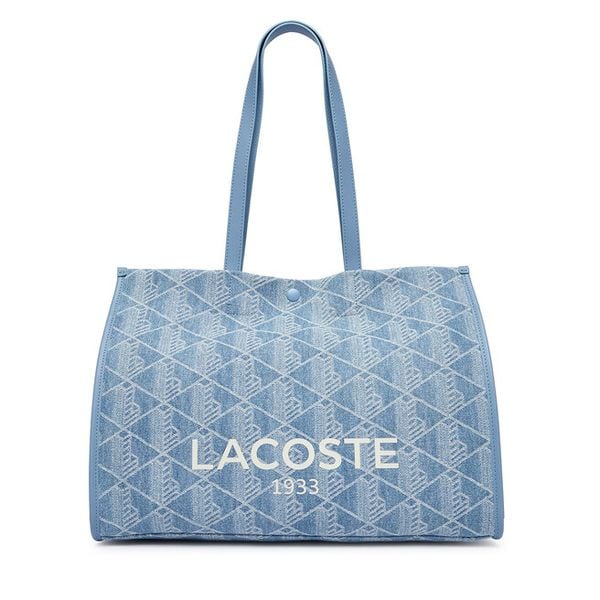 Torebka Lacoste. Niebieskie torebki do ręki damskie Lacoste, bez wzorów, bez dodatków. Za 771.99 zł.