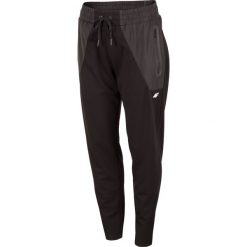 Spodnie dresowe damskie SPDD270 - głęboka czerń. Spodnie dresowe damskie marki 4f. Za 149.99 zł.