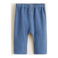 Mango Kids - Spodnie dziecięce Lolo 62-80 cm. Niebieskie spodnie materiałowe dla chłopców Mango Kids, bez wzorów, z bawełny. W wyprzedaży za 29.90 zł.