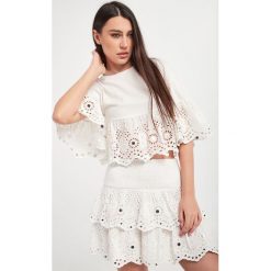 Bluzka BLUGIRL BLUMARINE. Bluzki damskie Blugirl Blumarine, bez wzorów, bez kołnierzyka, bez ramiączek. W wyprzedaży za 460.57 zł.