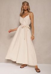 Beżowa Sukienka z Bawełną i Wiskozą z Ozdobnym Paskiem Savaine. Brązowe sukienki dla dziewczynek Renee, bez wzorów, z bawełny, eleganckie, bez ramiączek. Za 99.99 zł.