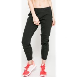 Adidas Performance - Spodnie. Szare spodnie sportowe damskie adidas Performance, z bawełny. W wyprzedaży za 279.90 zł.