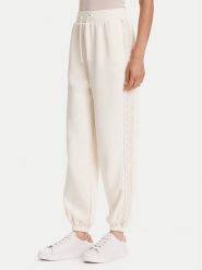 Guess Spodnie dresowe V5YB02 KB3P2 Écru Regular Fit. Spodnie dresowe damskie Guess, m, z aplikacjami, z dresówki. Za 219.99 zł.