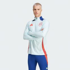 Bluza Spain Tiro 24 Competition Training. Czerwone bluzy męskie Adidas, l, bez wzorów, z materiału, bez kaptura, na fitness i siłownię. Za 365.20 zł.
