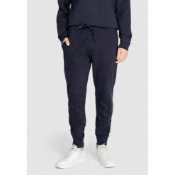 Spodnie Mężczyzna NAPAPIJRI MALIS. Niebieskie spodnie sportowe męskie Napapijri, m, bez wzorów. Za 334.90 zł.