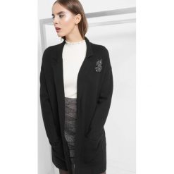 Kardigan z koralikami. Czarne kardigany damskie Orsay, z aplikacjami, z dzianiny. Za 139.99 zł.
