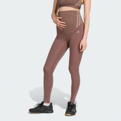 Legginsy Optime Essentials Full-Length (Maternity). Brązowe legginsy damskie Adidas, xs, bez wzorów, z materiału. W wyprzedaży za 142.35 zł.