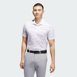 Koszulka Ultimate365 Mesh Glimmer Print Polo. Czerwone buty sportowe męskie Adidas, z meshu, bez zapięcia, na golfa. Za 279.00 zł.