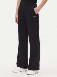 DKNY Sport Spodnie dresowe DP5P3601 Czarny Regular Fit. Czarne spodnie dresowe damskie DKNY Sport, m, bez wzorów, z dresówki. Za 299.99 zł.