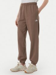 The North Face Spodnie dresowe Evolution Simple Dome NF0A8CWV Brązowy jasny Regular Fit. Brązowe spodnie dresowe damskie The North Face, l, bez wzorów, z bawełny. Za 279.99 zł.