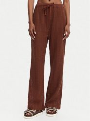 Roxy Spodnie materiałowe Mood Moving ERJX603493 Brązowy ciemny Regular Fit. Brązowe spodnie materiałowe damskie Roxy, m, bez wzorów, z bawełny. Za 259.99 zł.