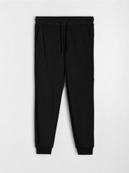 Spodnie jogger dresowe pique - czarny. Czarne spodnie sportowe męskie Sinsay, l, bez wzorów, z dresówki. W wyprzedaży za 25.99 zł.