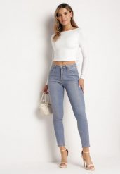 Jasnoniebieskie Jeansy Skinny z Bawełny Ozdobione Złotą Farbą Taidda. Niebieskie jeansy damskie Born2be. Za 129.99 zł.