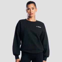 Bluza damska fitness oversize czarna Base. Czarne bluzy damskie GYMBEAM, m, bez wzorów, z bawełny, bez kaptura. Za 127.90 zł.
