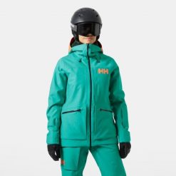 Damska kurtka turystyczna Helly Hansen Powderqueen 3.0. Zielone kurtki snowboardowe damskie Helly Hansen, bez wzorów, bez kaptura, narciarskie. W wyprzedaży za 1,676.50 zł.