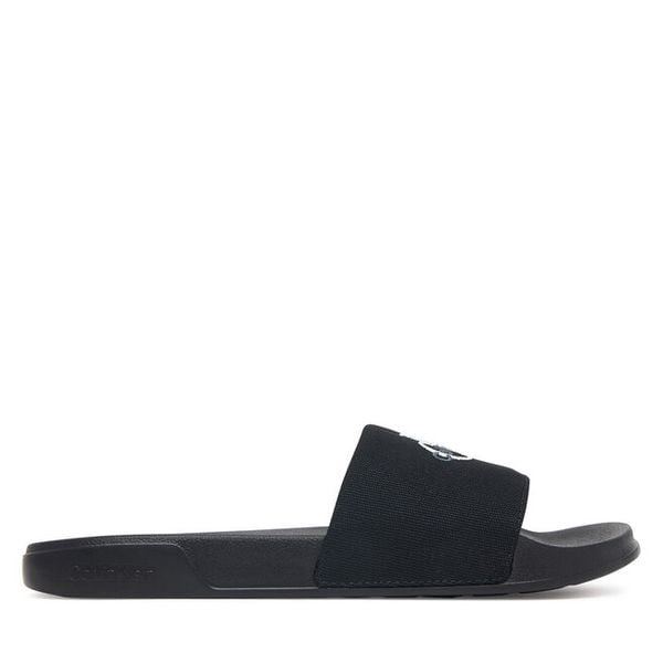 Klapki Calvin Klein. Czarne klapki damskie Calvin Klein, bez wzorów, bez obcasa. Za 169.99 zł.