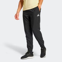 Spodnie dresowe męskie ADIDAS. Spodnie sportowe męskie Adidas, l, bez wzorów, z dresówki, na fitness i siłownię. Za 169.99 zł.