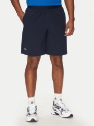 Lacoste Szorty tenisowe GH7452 Granatowy Regular Fit. Niebieskie krótkie spodenki sportowe męskie Lacoste, m, bez wzorów, z syntetyku, tenisowe. Za 209.99 zł.