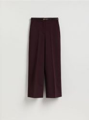 Spodnie z paskiem - ciemnofioletowy. Fioletowe spodnie materiałowe damskie Reserved, l, bez wzorów, z tkaniny. Za 159.99 zł.