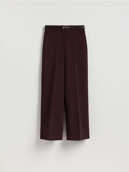 Spodnie z paskiem - ciemnofioletowy. Fioletowe spodnie materiałowe damskie Reserved, l, bez wzorów, z tkaniny. Za 159.99 zł.