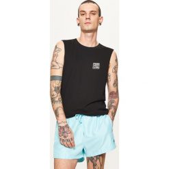 Spodenki kąpielowe - Zielony. Kąpielówki dla chłopców marki Cropp. W wyprzedaży za 29.99 zł.