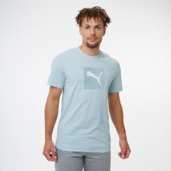 Koszulka z krótkim rękawem męska Puma Gym & Pilates. Niebieskie koszulki sportowe męskie Decathlon, m, bez wzorów, z bawełny, bez kołnierzyka, bez ramiączek, na jogę i pilates. Za 79.99 zł.