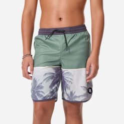 Spodenki surfingowe dla dzieci Decathlon 500 Photopalm. Fioletowe kąpielówki dla chłopców Decathlon, bez wzorów, z materiału. Za 59.99 zł.