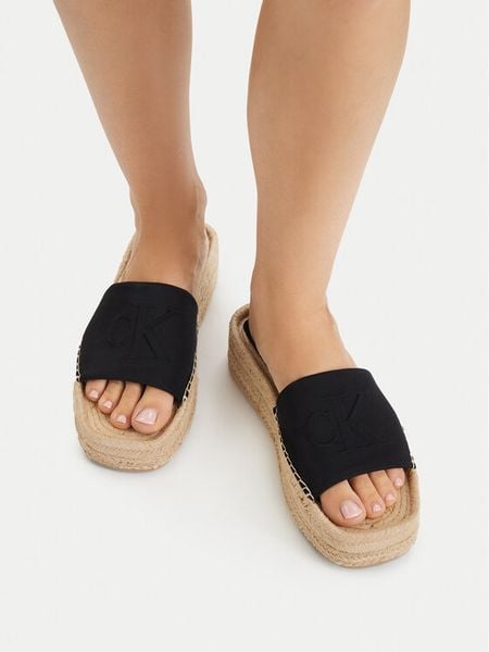 Calvin Klein Klapki Ebeth HW0HW02894 Czarny. Czarne espadryle damskie Calvin Klein, bez wzorów, z materiału, bez obcasa, bez zapięcia. Za 224.99 zł.