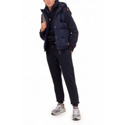 Kurtka bez rękawów z kapturem Superdry Everst. Niebieskie kurtki męskie Superdry., m, bez wzorów, z puchu, z kapturem. W wyprzedaży za 474.20 zł.