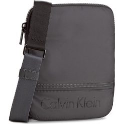 Saszetka CALVIN KLEIN - Matthew Flat Crossov K50K502881 009. Saszetki męskie marki Calvin Klein. W wyprzedaży za 219.00 zł.