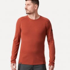Koszulka trekkingowa męska z długim rękawem Forclaz MT500 merino. Brązowe bluzki z długim rękawem męskie FORCLAZ, l, bez wzorów, z materiału, bez kołnierzyka. Za 129.99 zł.